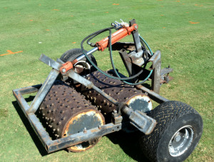 Dr. Ben Wherley, a Texas A&M AgriLife Research turfgrass ecologist, used this Brinkman traffic simulator on his turfgrass plots.(Texas A&M AgriLife Communications photo by Kay Ledbetter)